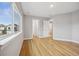 Bright bedroom with hardwood floors and natural light at 779 Kohlor Dr, Lafayette, CO 80026