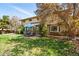 Spacious backyard featuring a patio with outdoor seating and lush green lawn at 6219 S Krameria St, Centennial, CO 80111