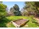 Green backyard featuring a wooden garden bed ready for planting at 6219 S Krameria St, Centennial, CO 80111