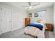Bedroom with simple decor, bright window and ceiling fan at 6219 S Krameria St, Centennial, CO 80111
