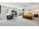 Spacious main bedroom featuring a work space, sitting area and a ceiling fan at 6219 S Krameria St, Centennial, CO 80111