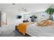Large main bedroom with a large flat screen television and large windows at 6219 S Krameria St, Centennial, CO 80111