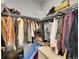 Walk-in closet featuring extensive built-in storage and organization features at 6211 W 28Th Ct, Wheat Ridge, CO 80214