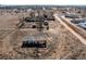 A distant and high view of a property with outbuildings at 18199 E 160Th Ave, Brighton, CO 80601