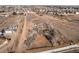 A home set on a large lot with outbuildings, as seen from an aerial view at 18199 E 160Th Ave, Brighton, CO 80601