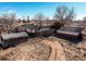 Aerial view of the property with a shed, garage, and detached garage at 18199 E 160Th Ave, Brighton, CO 80601