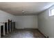 A blank basement canvas features unfinished walls, exposed studs, and a single window for renovations at 18199 E 160Th Ave, Brighton, CO 80601