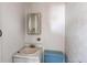 A small bathroom with a vintage sink and toilet needs a complete renovation and remodel at 18199 E 160Th Ave, Brighton, CO 80601