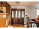 Entryway featuring a decorative door with diamond-shaped glass, brick, and wooden floors at 18199 E 160Th Ave, Brighton, CO 80601