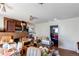 Alternate view of living room with lots of stuff, a window, and a brick fireplace at 18199 E 160Th Ave, Brighton, CO 80601