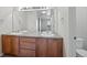 Bathroom with a double sink vanity and big mirror at 23451 E 5Th Dr # 203, Aurora, CO 80018