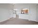 Bright living room with access to the kitchen at 23451 E 5Th Dr # 203, Aurora, CO 80018
