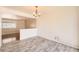 Cozy dining room with stylish chandelier and bright natural light at 13086 E Alaska Ave, Aurora, CO 80012