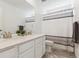 Elegant bathroom with a double vanity, modern fixtures, and a shower-tub combination at 13220 E 110Th Pl, Commerce City, CO 80022