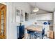 Eat-in dining area featuring white painted brick, modern lighting, and ample storage at 3736 N Mariposa St, Denver, CO 80211