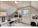 Bright home office featuring a desk, chair, and natural light from a window and glass paneled door at 3736 N Mariposa St, Denver, CO 80211