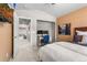 Comfortable bedroom with a built-in desk area and ample natural light at 19064 E Oak Creek Way, Parker, CO 80134