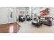 Living room featuring plush furniture, natural light, and decorative accents at 19064 E Oak Creek Way, Parker, CO 80134