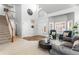 Bright living room featuring neutral color palette and open layout at 19064 E Oak Creek Way, Parker, CO 80134