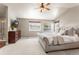 Spacious main bedroom featuring vaulted ceilings and a ceiling fan at 19064 E Oak Creek Way, Parker, CO 80134