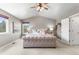 Inviting main bedroom with plush carpeting, neutral tones, and ample natural light at 19064 E Oak Creek Way, Parker, CO 80134