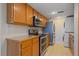 Well-equipped kitchen with stainless steel appliances, stylish cabinets, and modern countertops at 9255 E Lehigh Ave # 194, Denver, CO 80237