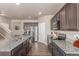 Bright kitchen boasts stainless steel appliances, granite countertops, and ample cabinet space at 5758 Echo Park Cir, Castle Rock, CO 80104