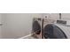 Convenient laundry room equipped with modern, stainless steel washer and dryer units at 5758 Echo Park Cir, Castle Rock, CO 80104