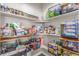 Walk-in pantry featuring wooden shelves and wire basket organizers offering plenty of storage space at 5758 Echo Park Cir, Castle Rock, CO 80104