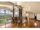 Hallway overlooking main living area with stone detailing and cathedral ceiling at 28532 Hummingbird Hill Rd, Conifer, CO 80433