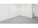 Cozy bedroom with sliding closet doors and plush carpeting at 3450 S Eagle St # 101, Aurora, CO 80014