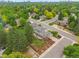 Neighborhood aerial shot shows mature landscaping, well-maintained homes, and quiet streets at 5991 S Eudora Way, Centennial, CO 80121