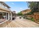Spacious backyard deck with outdoor seating, perfect for entertaining or relaxing at 5991 S Eudora Way, Centennial, CO 80121