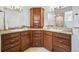 Primary bathroom features dual sinks, decorative cabinetry, and tile flooring at 5991 S Eudora Way, Centennial, CO 80121