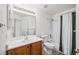 Bathroom features a tub and shower combination, vanity, and toilet at 9765 Merimbula St, Highlands Ranch, CO 80130