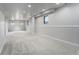 Expansive basement area offers new plush carpeting, fresh paint, and natural light at 7930 Alkire St, Arvada, CO 80005