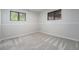 Recently renovated bedroom showcases plush carpeting, fresh paint, and a natural, well-lit ambiance at 7930 Alkire St, Arvada, CO 80005