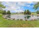 Landscaped pond with rocks and a fountain at 7930 Alkire St, Arvada, CO 80005