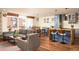 Open concept living room and kitchen with hardwood floors at 4570 E Yale Ave # 306, Denver, CO 80222
