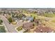 Aerial view of the neighborhood showcasing the community, landscaping, and proximity to nearby amenities at 8922 S Tuscany Ln, Highlands Ranch, CO 80130