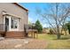 A beautiful backyard space with deck, stone, and a grassy area at 8922 S Tuscany Ln, Highlands Ranch, CO 80130