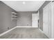 Neutral bedroom with closet, and view to another room at 8922 S Tuscany Ln, Highlands Ranch, CO 80130