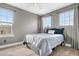 Bedroom featuring carpet, neutral walls, and window with backyard view at 8922 S Tuscany Ln, Highlands Ranch, CO 80130