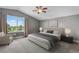 Bedroom featuring a large window and views of the green landscape outside at 8922 S Tuscany Ln, Highlands Ranch, CO 80130