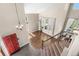 Spacious foyer with high ceilings, elegant staircase, and ample natural light at 8922 S Tuscany Ln, Highlands Ranch, CO 80130