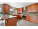 A modern kitchen featuring stylish cabinetry, tile backsplash, and stainless steel appliances at 8922 S Tuscany Ln, Highlands Ranch, CO 80130