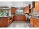 Well-equipped kitchen with a functional layout, island, and plentiful counter space at 8922 S Tuscany Ln, Highlands Ranch, CO 80130