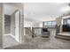 Open loft space with plush carpet and views of the stairwell and a bedroom at 8922 S Tuscany Ln, Highlands Ranch, CO 80130