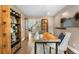 Charming home office with wood floors, French doors, and built-in shelving at 8922 S Tuscany Ln, Highlands Ranch, CO 80130