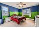 Cheerful bedroom featuring colorful walls, matching decor, and a bright, airy feel at 333 Mesa St, Brighton, CO 80601
